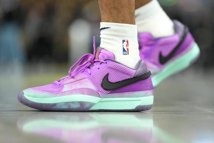 Memphis Grizzlies guard Ja Morant's purple and black Nike sneakers.